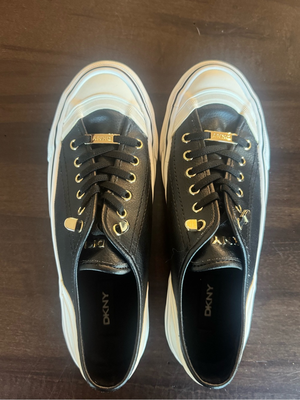 DKNY Black and White Low-Top Sneakers with Gold Hardware